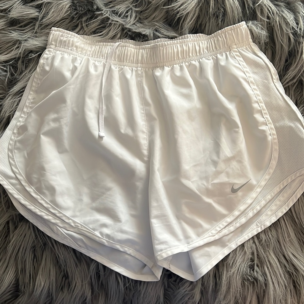 White Nike dry fit running shorts. Size Medium.